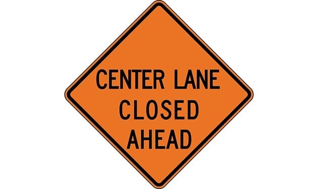 Center Lane Closed Ahead Construction Sign