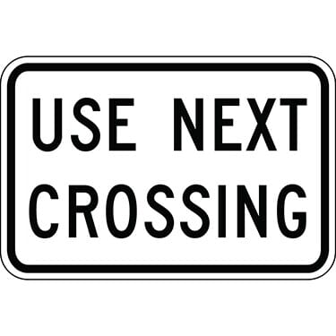 Use Next Crossing Warning Sign