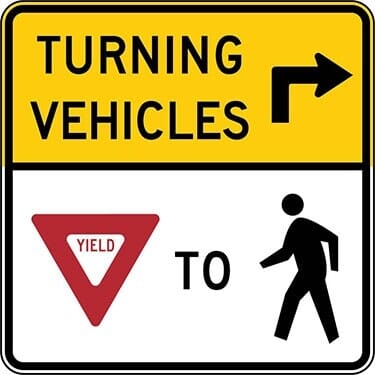 Turning Traffic Must Yield to Pedestrians with Right Arrow Sign
