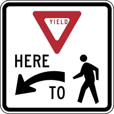 Yield Here To Pedestrians Left Arrow with Ped Symbol Sign
