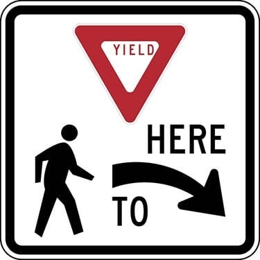 Yield Here To Pedestrians Right Arrow with Ped Symbol Sign