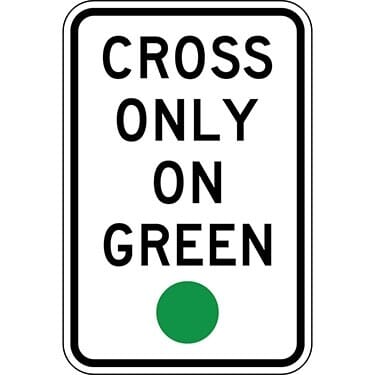Cross on Green Light Only Sign