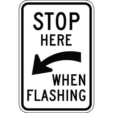 Stop Here When Flashing with Left Arrow Sign