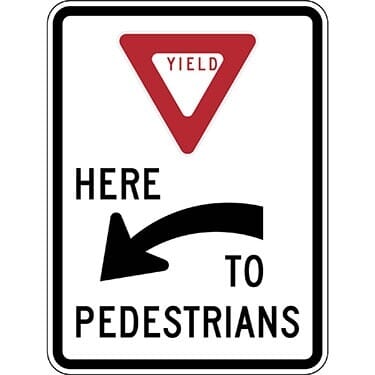Yield Here To Pedestrians Left Arrow Sign